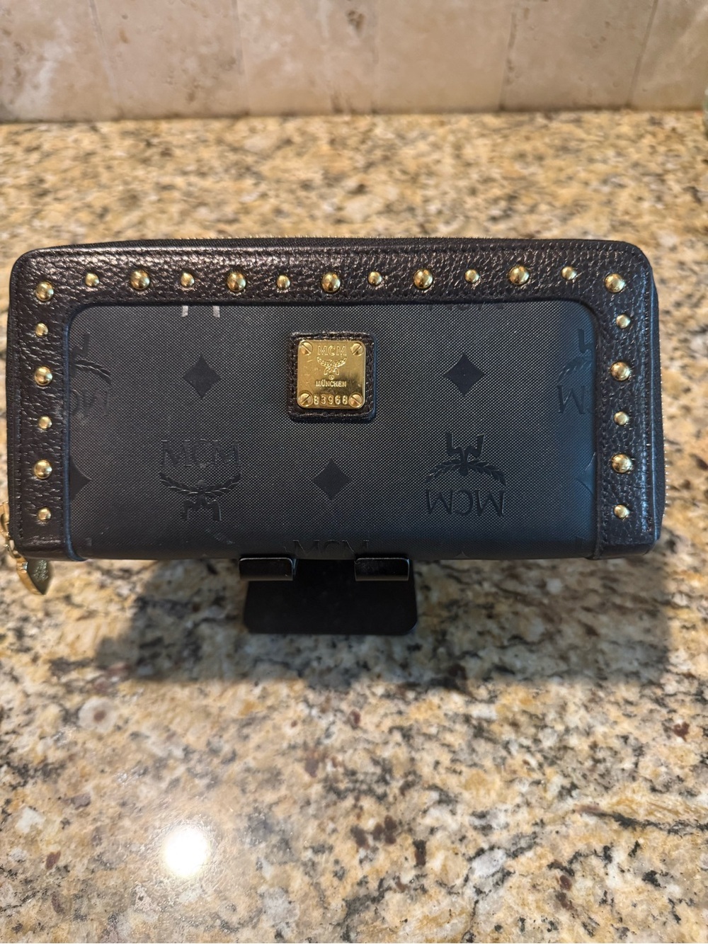MCM Black Monogram Zip Wallet with Brown gold studded trim